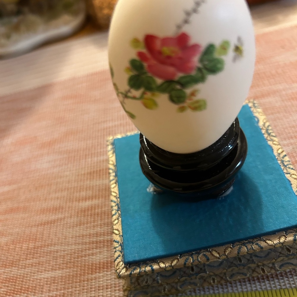 Painted egg on stand